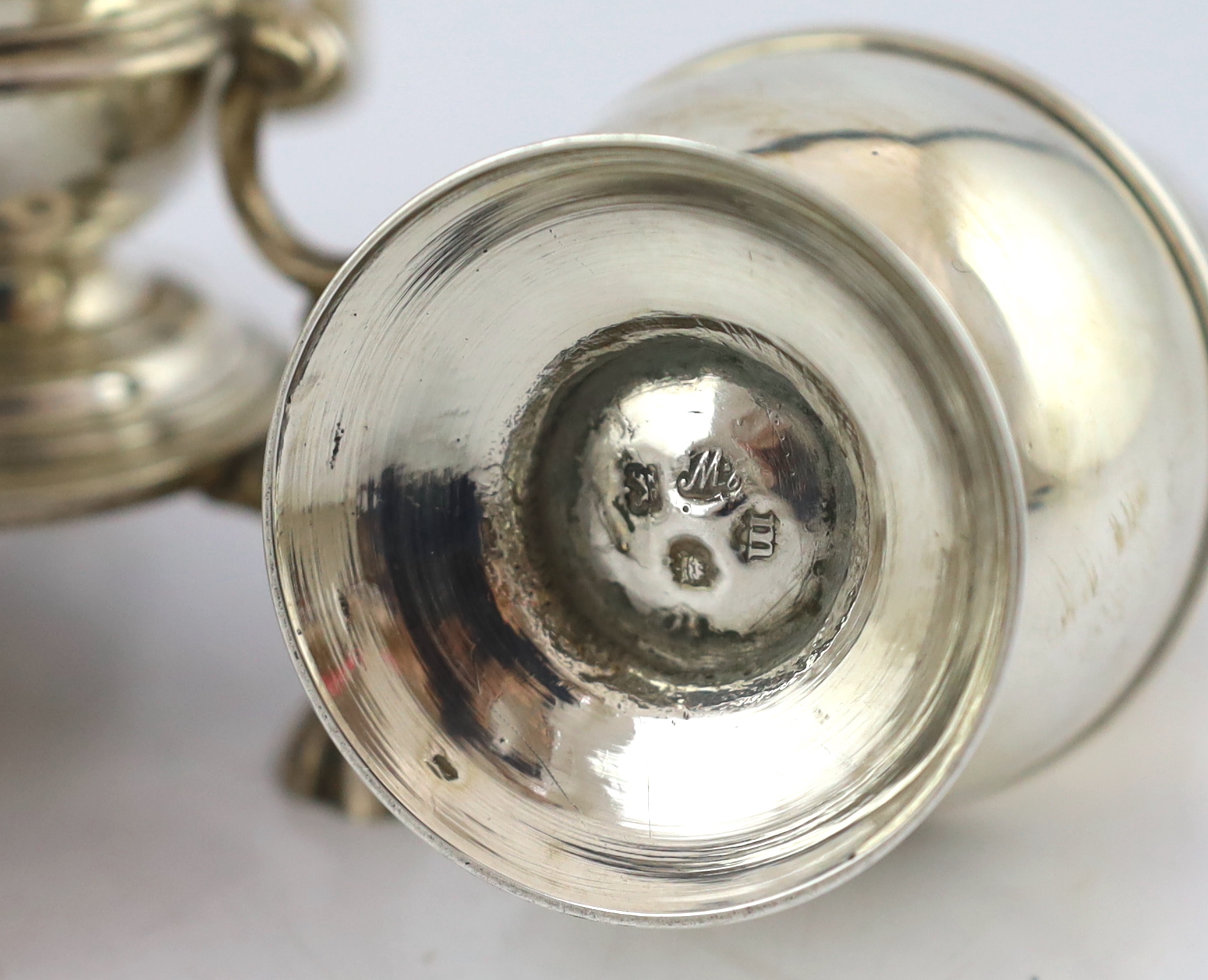 A George II silver cruet stand, with three matching graduated casters, by Samuel Wood